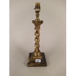 An early 20th Century Corinthian column brass table lamp with barley twist column and wide stepped