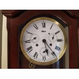 A Vienna style mahogany cased two weight wall clock