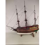 A large scratch built wood Elizabethan galleon, hand painted with rigging,