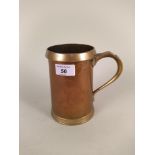 A 19th Century copper and brass quart tankard stamped LCC
