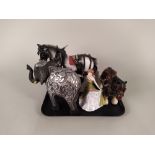 Two pottery model shire horses,