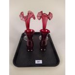 A pair of cranberry to clear glass vases plus a small pair of ruby vases