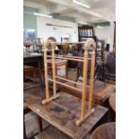 An Edwardian pine towel rail