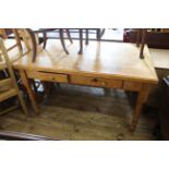 A Victorian style pine kitchen table