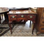 A George II mahogany three drawer low boy