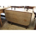 A 19th Century oak drop leaf table