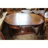 A 19th Century mahogany extending dining table