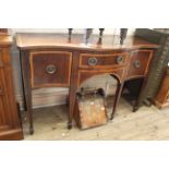 A 19th Century inlaid mahogany Regency style serpentine front sideboard