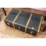 A vintage bentwood and canvas steamer travelling trunk