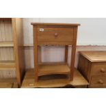 A modern light oak single drawer side cabinet