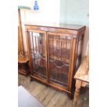 An early 20th Century mahogany glazed two door cabinet