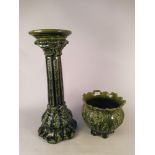 A late Victorian Art Nouveau period green finish jardiniere on stand, the pot marked Euston,