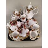 A Royal Albert Old Country Roses part tea set including tea and coffee pots, two jugs, sugar bowl,