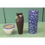 A blue and white pottery umbrella/stick stand,
