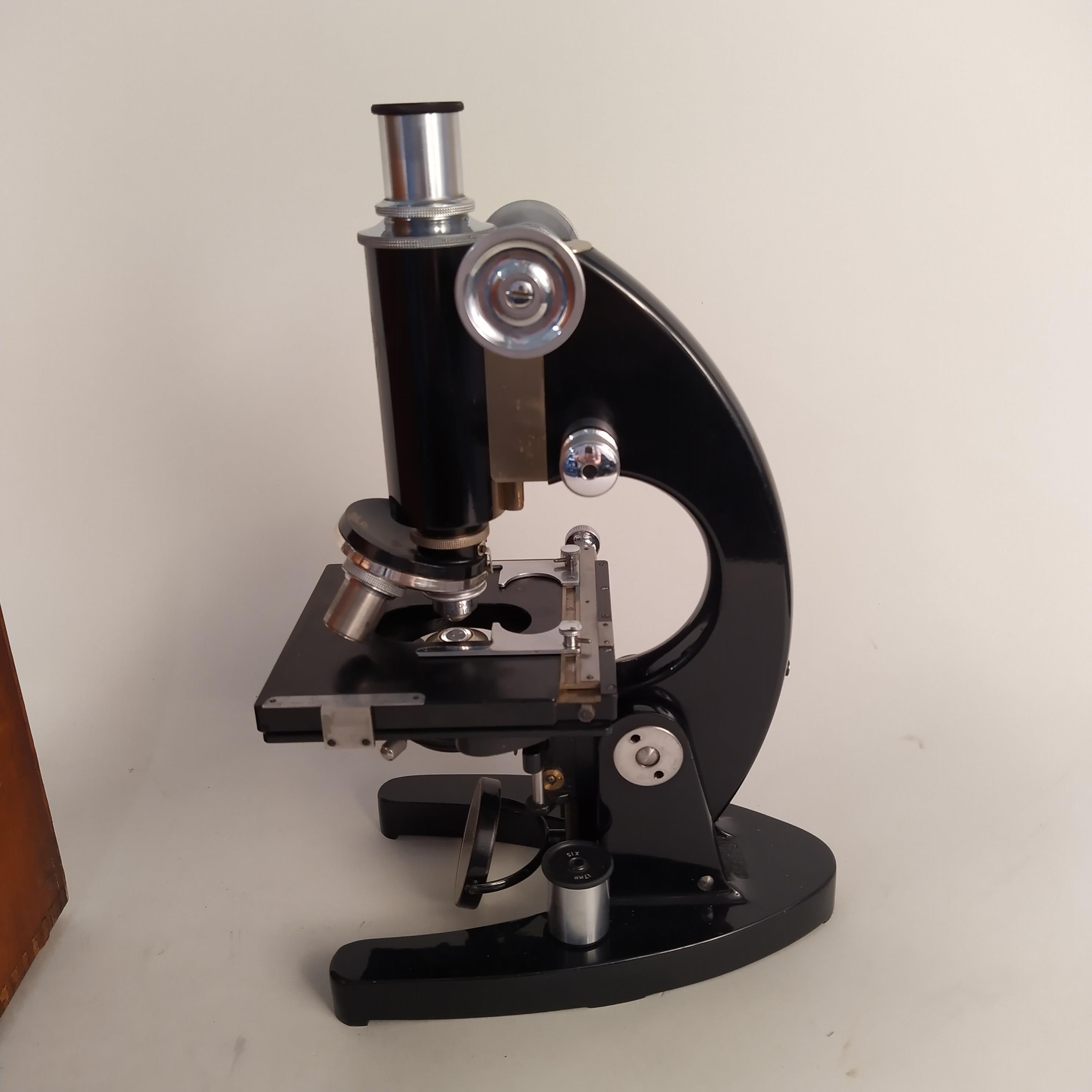 A mid century wooden boxed microscope marked C Baker 32420 London with various extra lenses - Image 2 of 3
