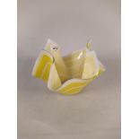 A 1960's yellow and cream glass handkerchief bowl