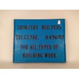 A substantial wooden painted vintage trades sign for Shorters Builders Gt Yarmouth