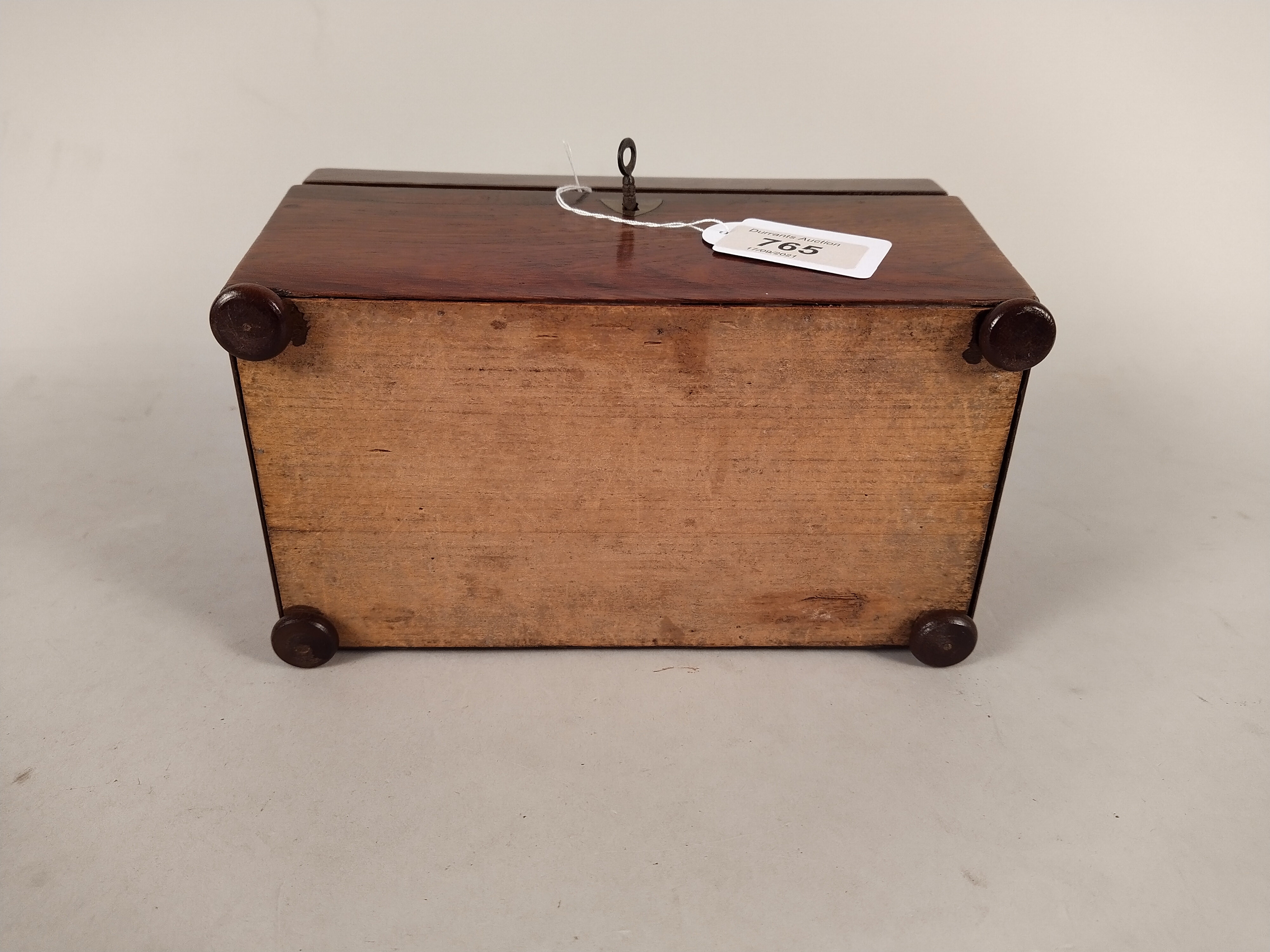 A Victorian rosewood veneered double section tea caddy with void interior and four bun feet, - Image 3 of 3