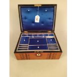 A marquetry inlaid sewing box, the interior is blue velvet and fitted with lift out tray,