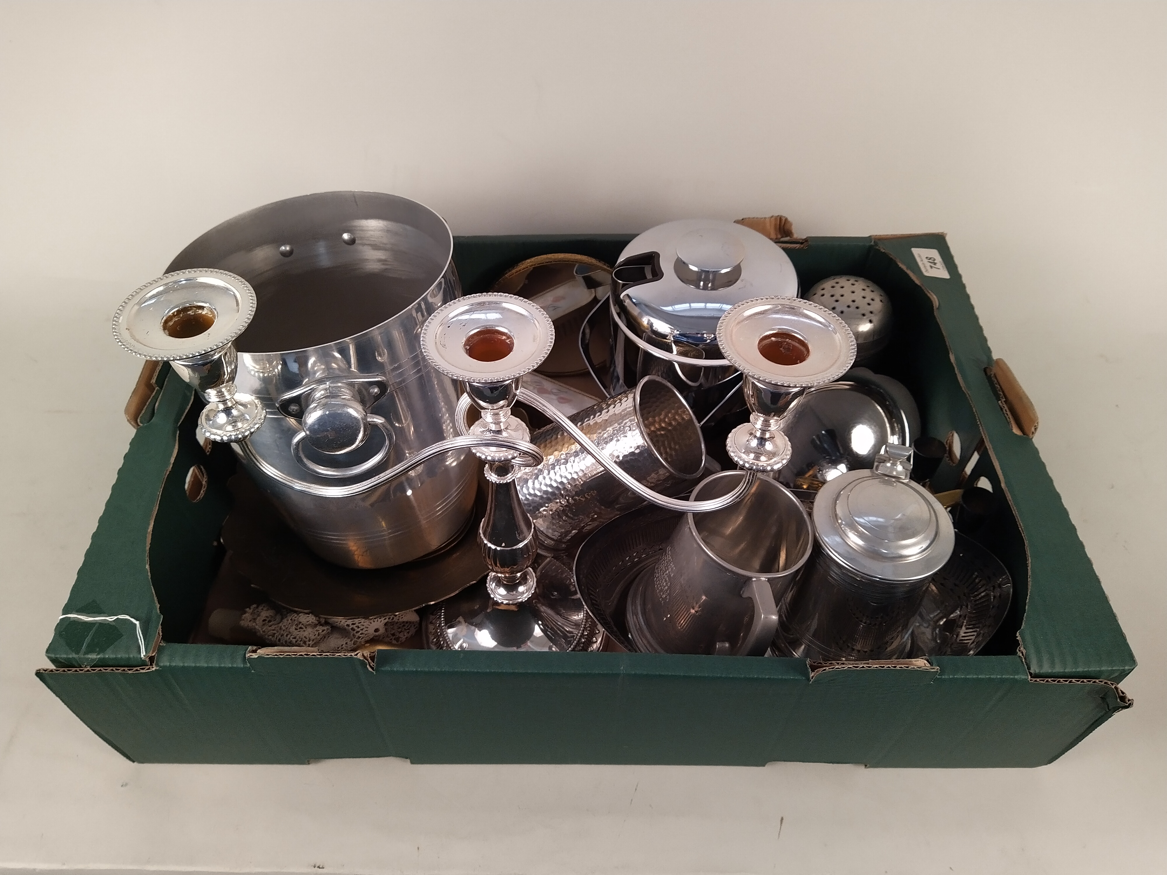 A box of mixed metal wares including champagne ice bucket, plated candelabra,