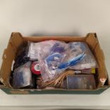 A box containing assorted Big Game sea lures,