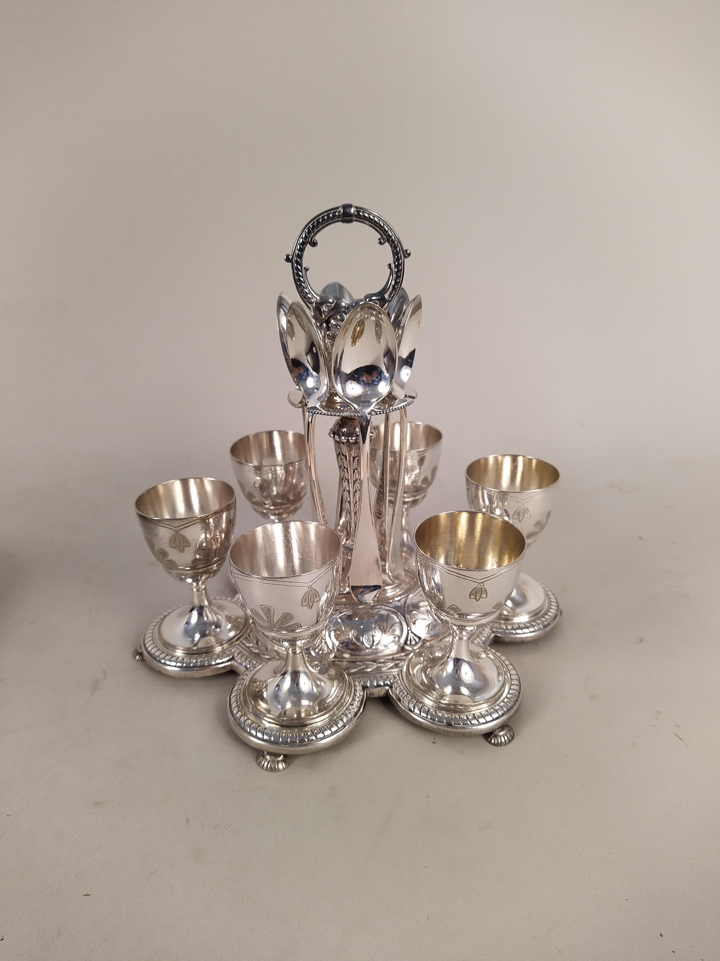 A white metal 'Dial a Drink' cocktail shaker plus an Elkington silver plate six setting egg cruet - Image 2 of 3