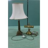 A brass student's lamp and a brass column table lamp