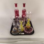 A pair of cranberry flashed decanters plus three celery vases,