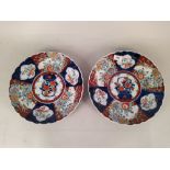 A pair of early 19th Century Chinese hand painted large plates,