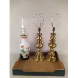 A large pair of brass lamp bases,