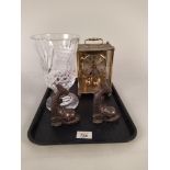 A finely cut celery vase plus a pair of bronze dolphins and a brass finish anniversary clock