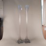 A pair of large glass lily vases,