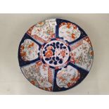 An early 19th Century hand painted charger,