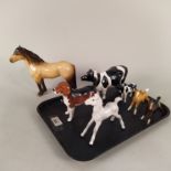 A Beswick palomino horse, a Jersey cow (horn as found), 'Wendover Billy' beagle,