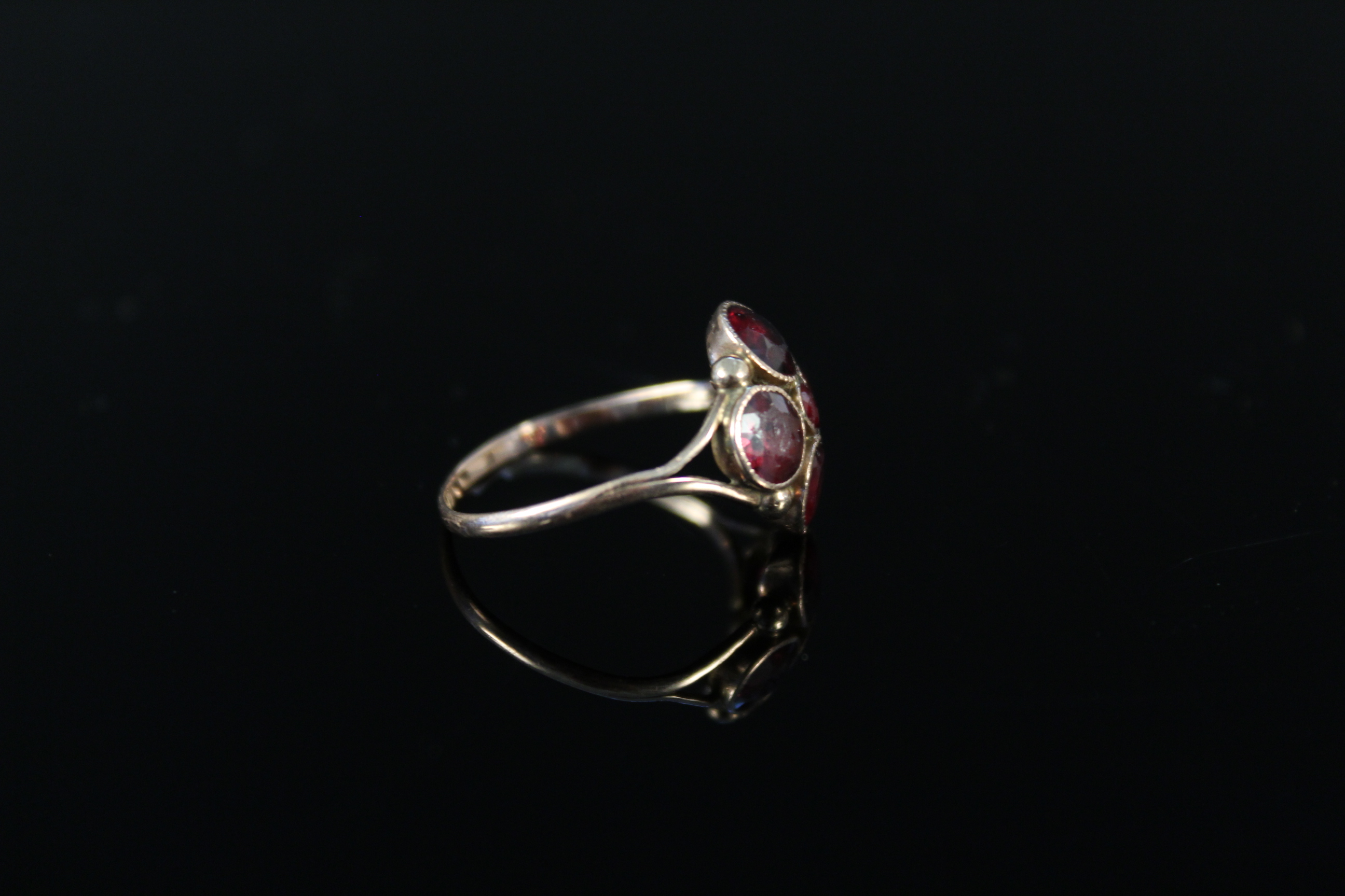 A 9ct gold garnet set ring (band misshapen), weight approx 1. - Image 3 of 3