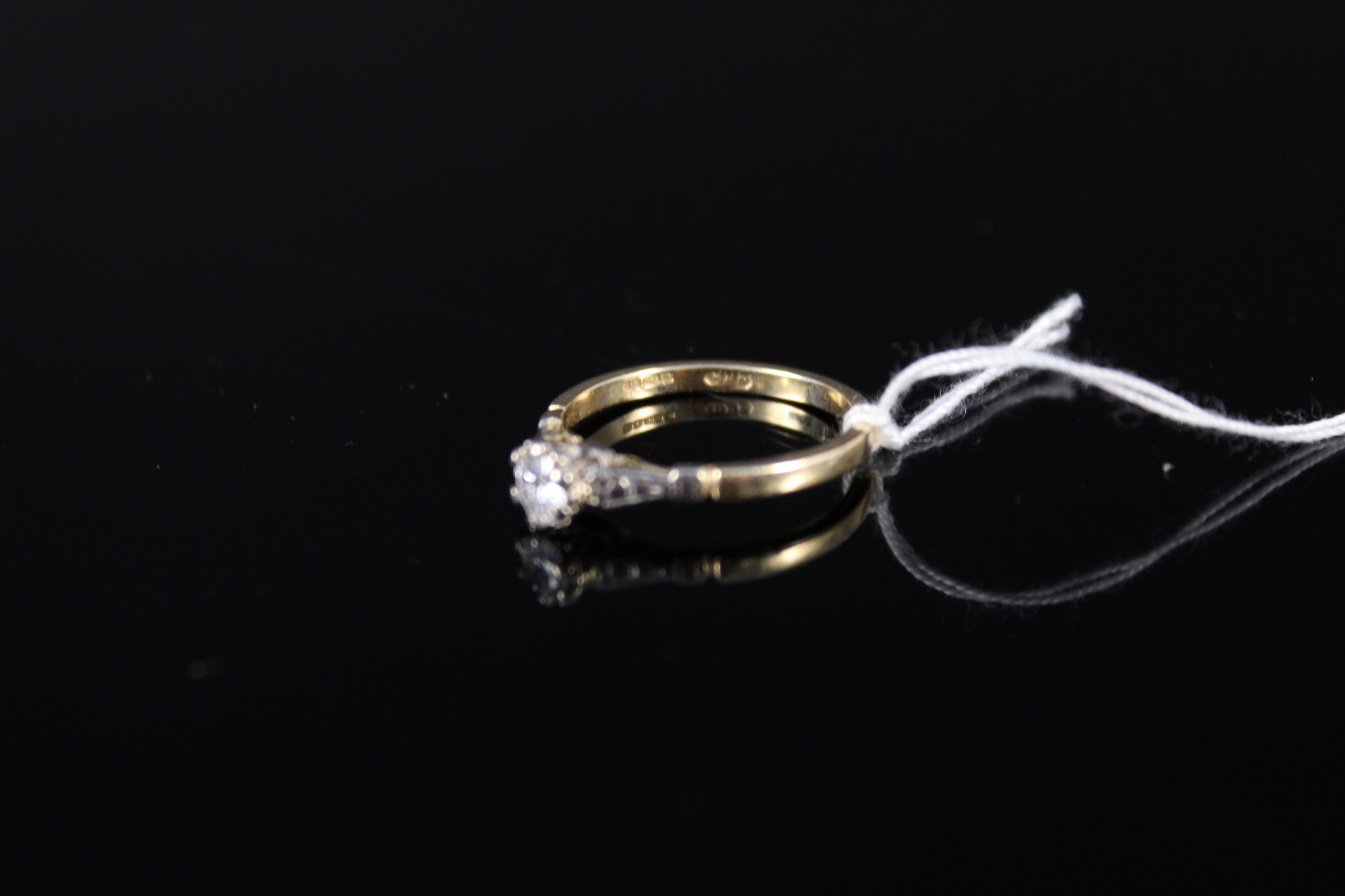 An 18ct gold solitaire diamond ring in raised claw setting, size M, weight approx 2. - Image 2 of 3