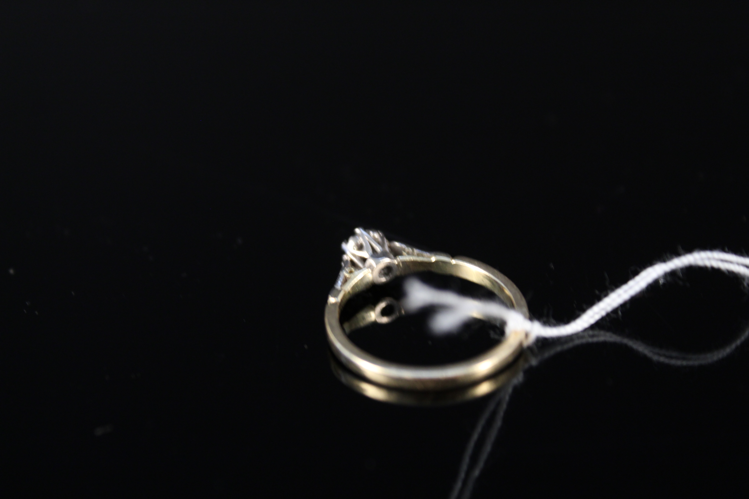 An 18ct gold solitaire diamond ring in raised claw setting, size M, weight approx 2. - Image 3 of 3