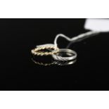 A 9ct gold twisted design band ring with plain and rope detail, size M 1/2,