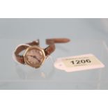 A c1930's ladies 9ct gold wristwatch with textured dial and blue steel hands