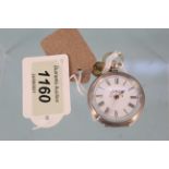 A ladies silver cased fob watch with florally decorated dial