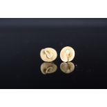 A pair of 9ct gold spiral form earrings,