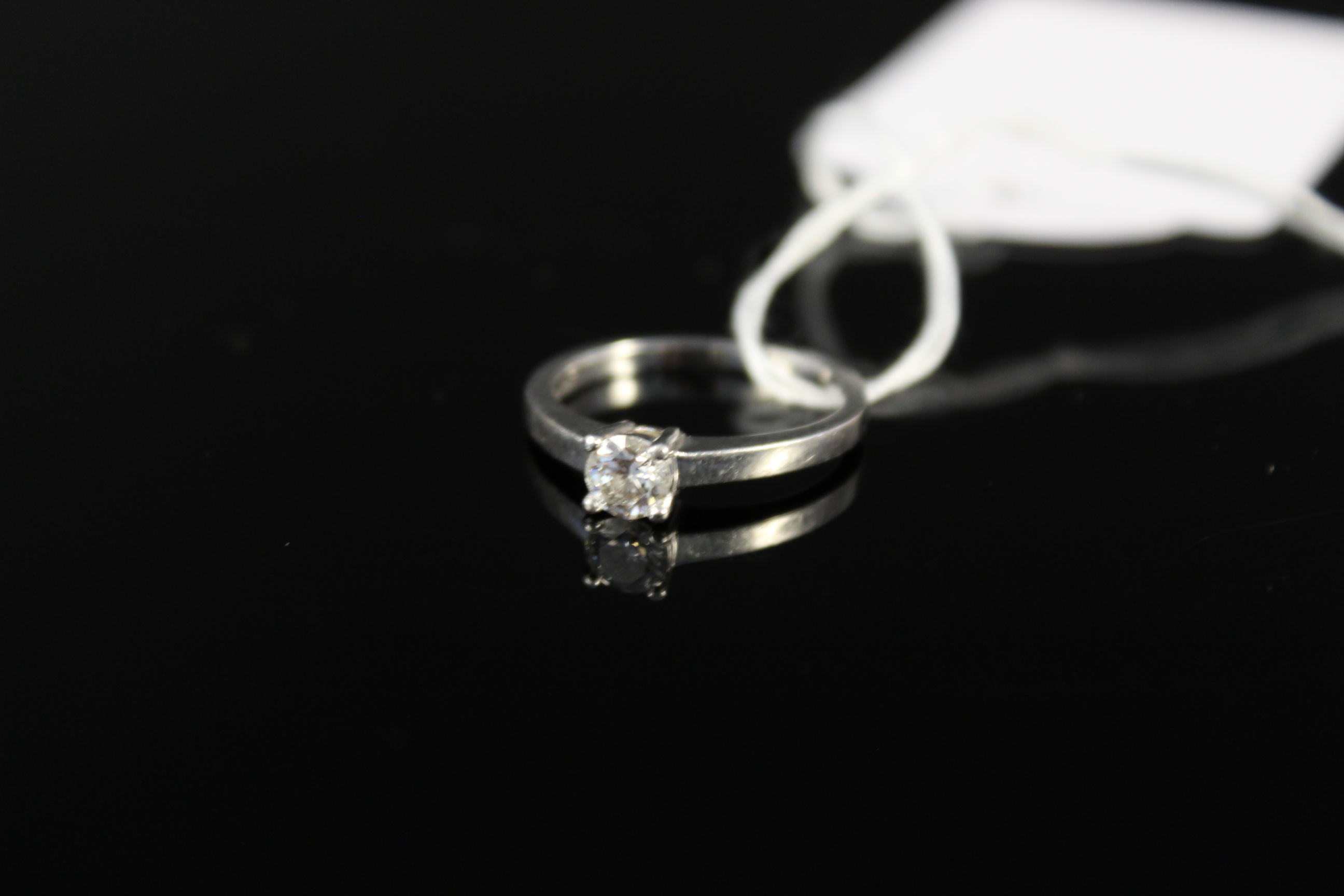 A platinum solitaire diamond ring, size H, diamond approx 0.3cts, weight approx 3.