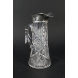 A cut glass silver rimmed lemonade jug (marks rubbed),