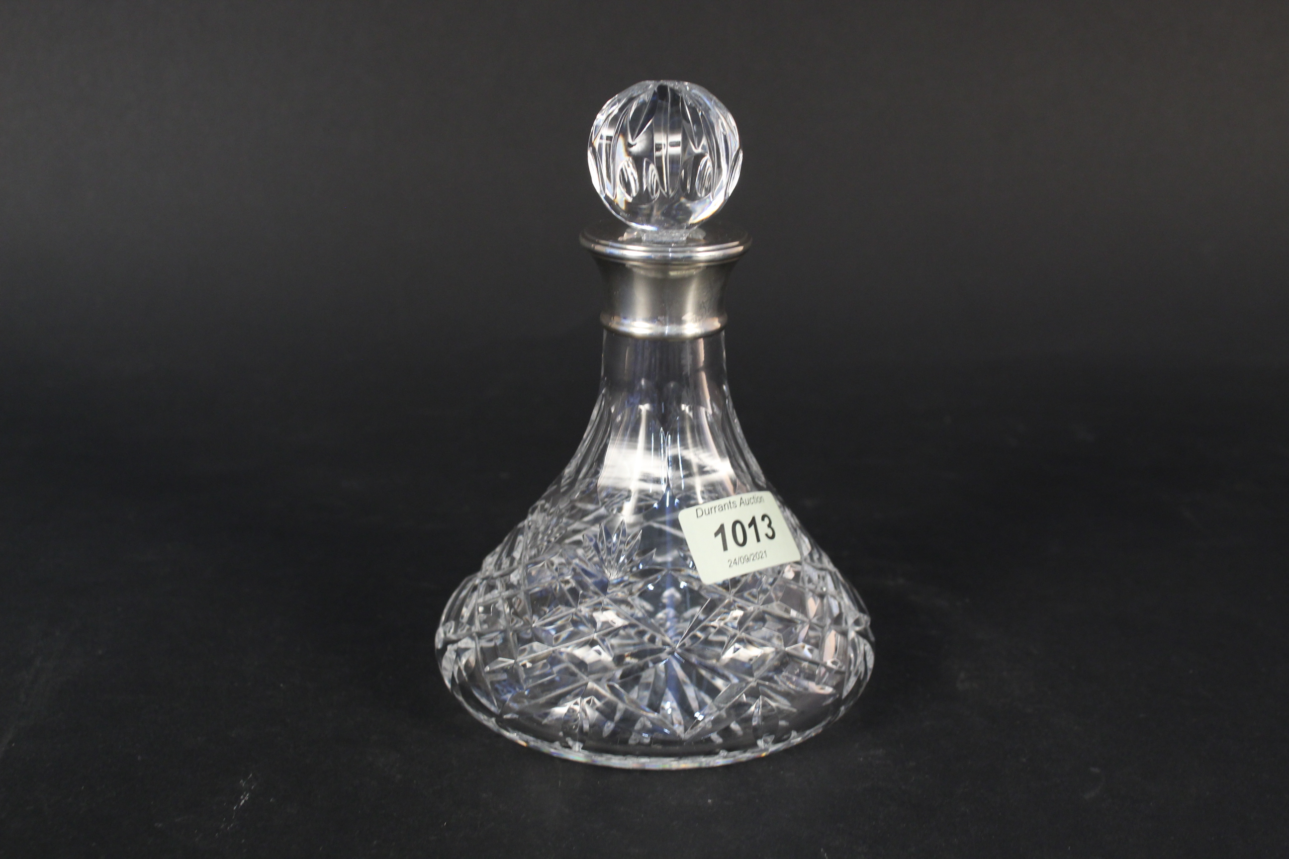 A modern cut glass silver collared decanter, hallmarked Birmingham 2000,
