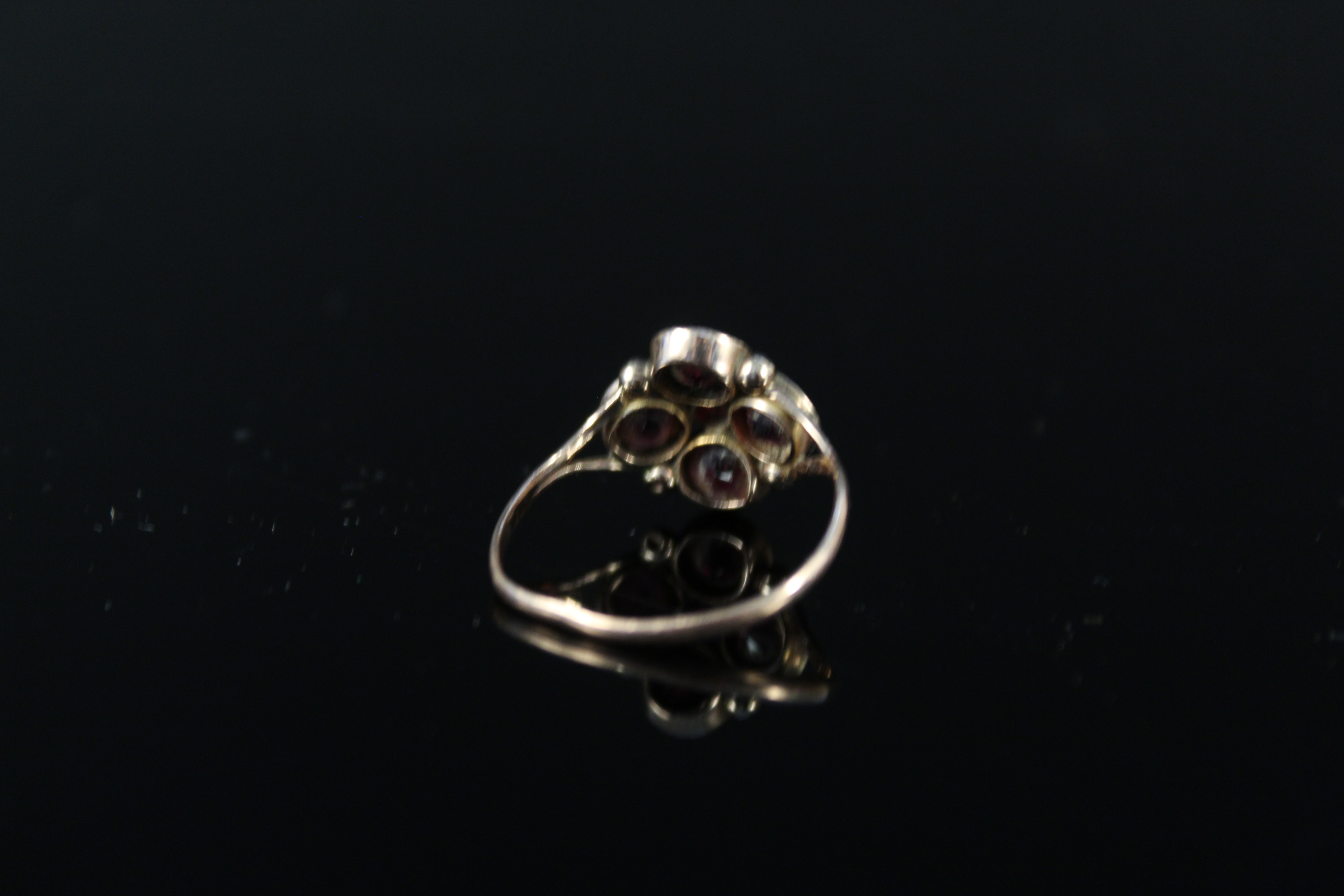 A 9ct gold garnet set ring (band misshapen), weight approx 1. - Image 2 of 3