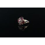 A 9ct gold garnet set ring (band misshapen), weight approx 1.