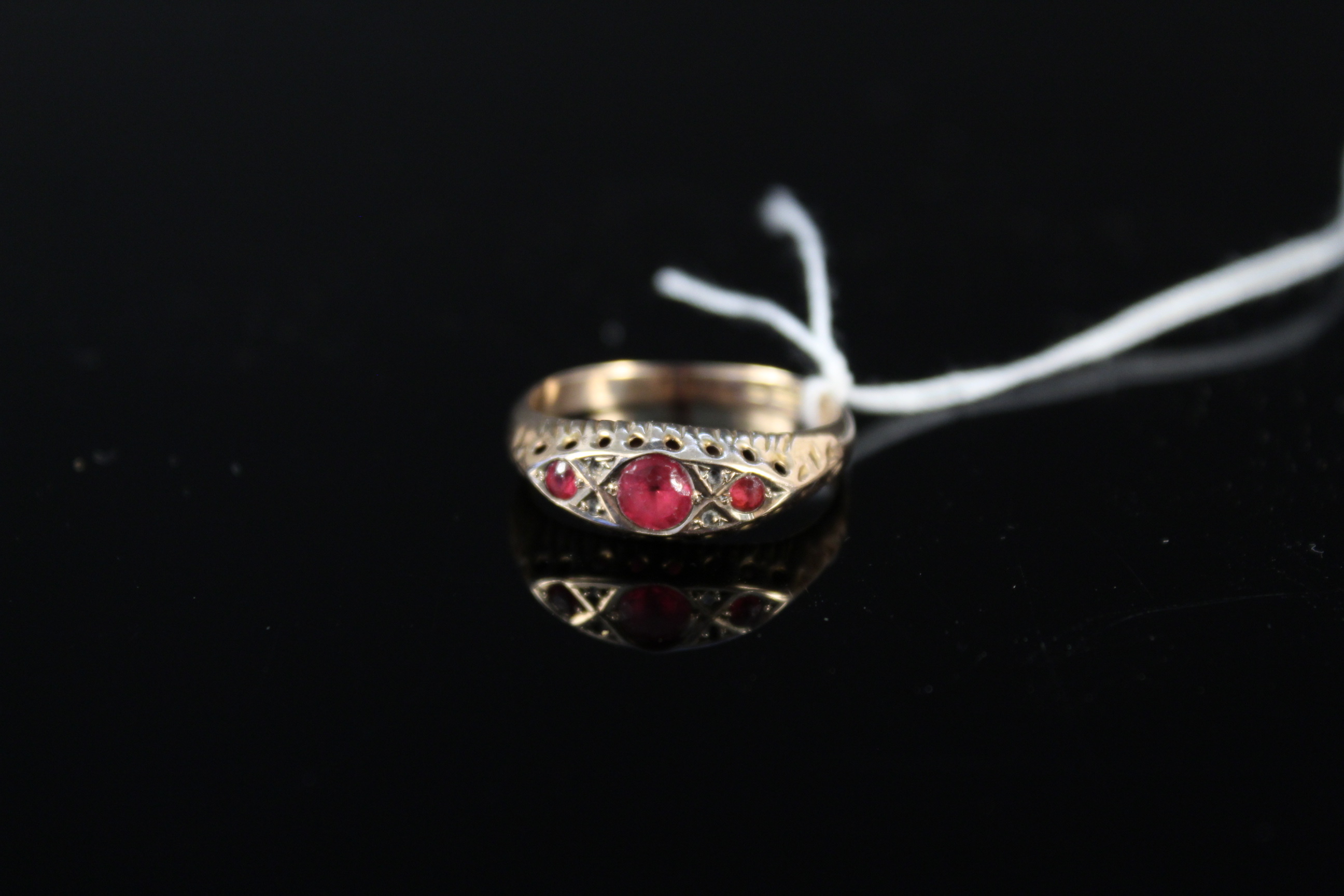 A 9ct gold Chester hallmarked red stone set ring,