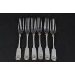 A set of six silver shell pattern forks, hallmarked Sheffield 1916,