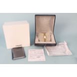 A lady's 18ct gold Longines wristwatch on 18ct gold bracelet, with original box and papers,