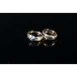 A 9ct gold band ring with white metal details to outer band plus a two colour gold 9ct ring of